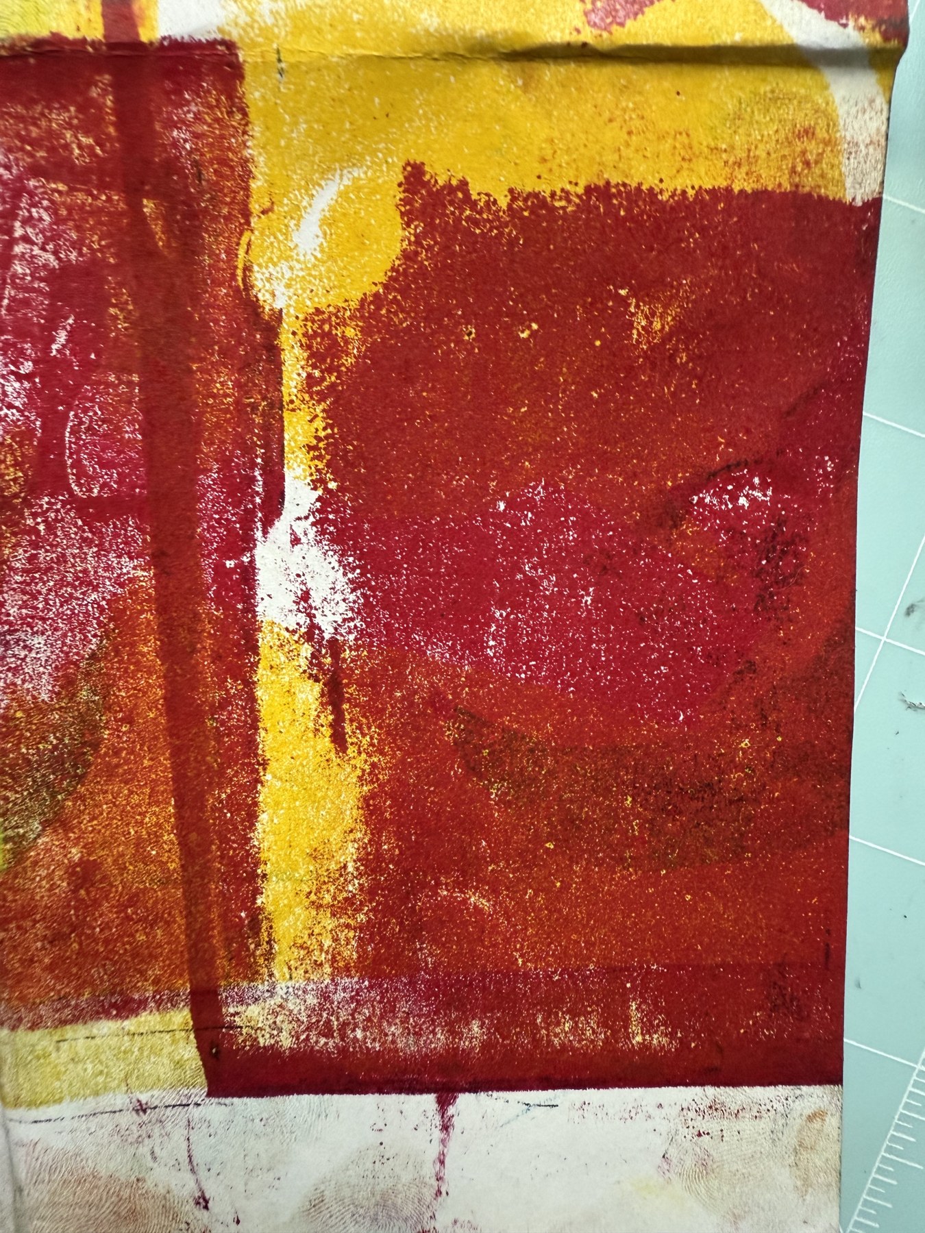 Red and yellow monoprint with bold texture