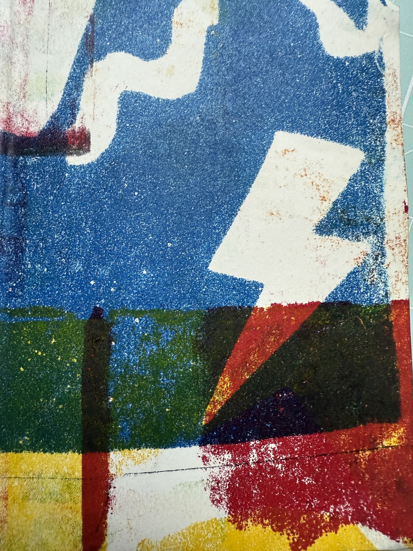 Geometric monoprint in blue, red, green, and yellow