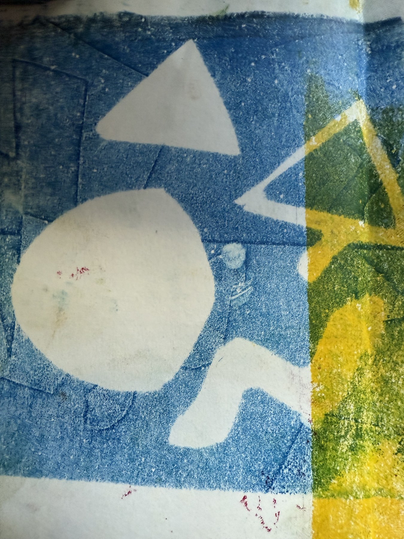 Blue and yellow monoprint with geometric shapes