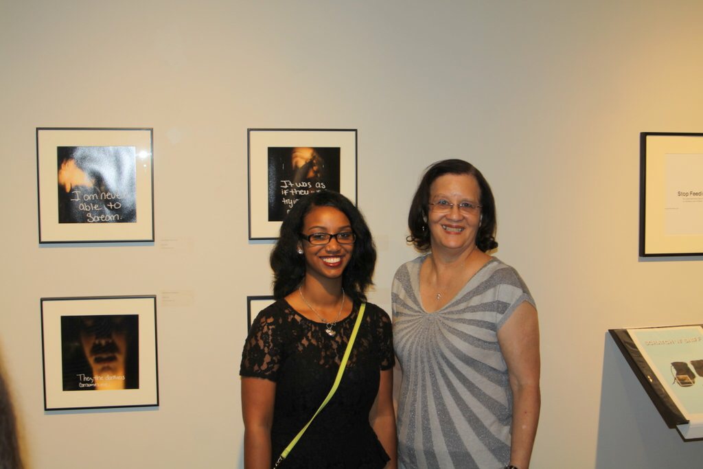 Jasmine Patterson with family and young guests at her Senior Show Exhibition