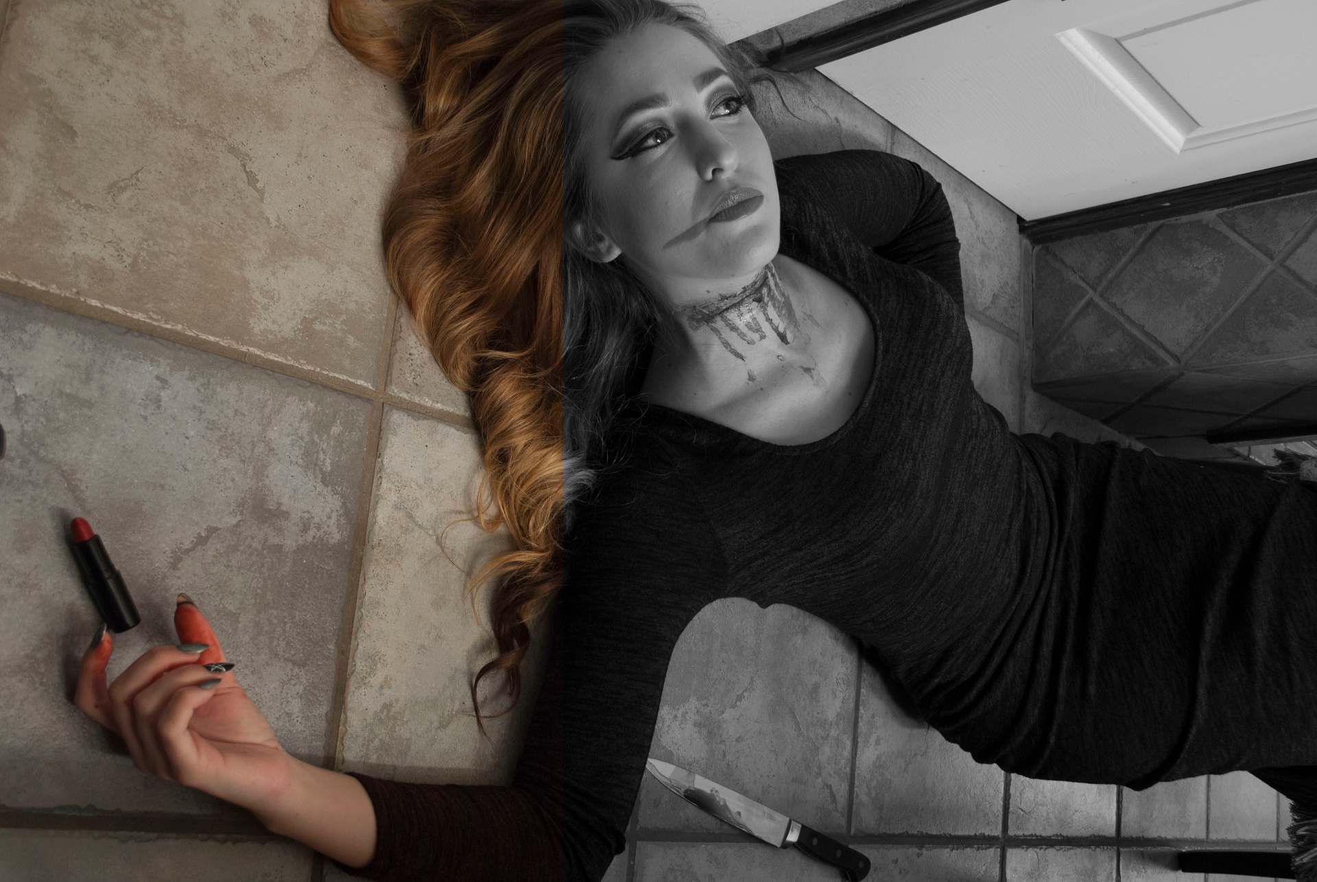 Woman lying on a tiled bathroom floor beside lipstick and a knife, rendered mostly in black and white with selective red color
