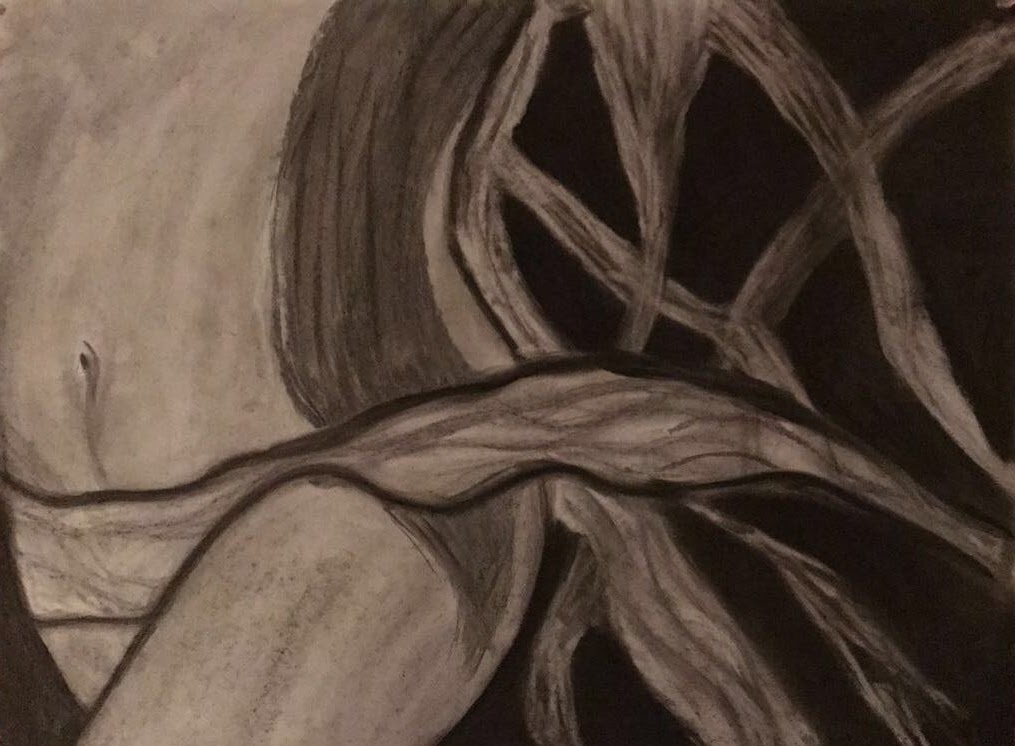Charcoal study of folded drapery with strong highlights and shadows