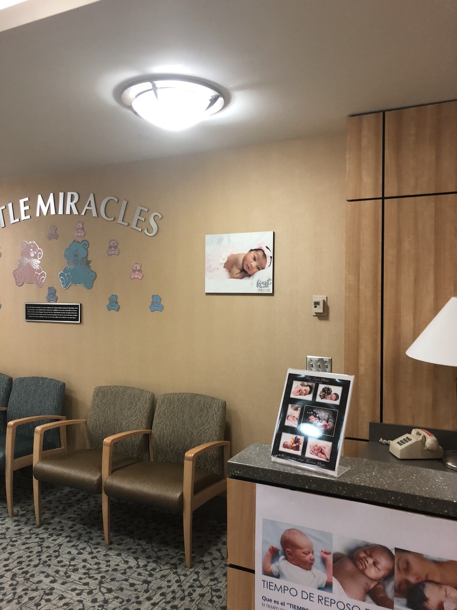 Little Miracles waiting room at Ochsner Hospital in New Orleans with framed First Touch print displays